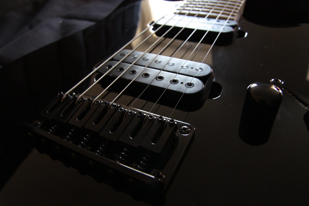 De 7 snarige gitaar afbeelding